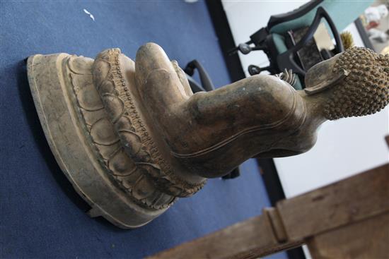 A large patinated bronze figure of a seated Buddha, 3ft 1in.